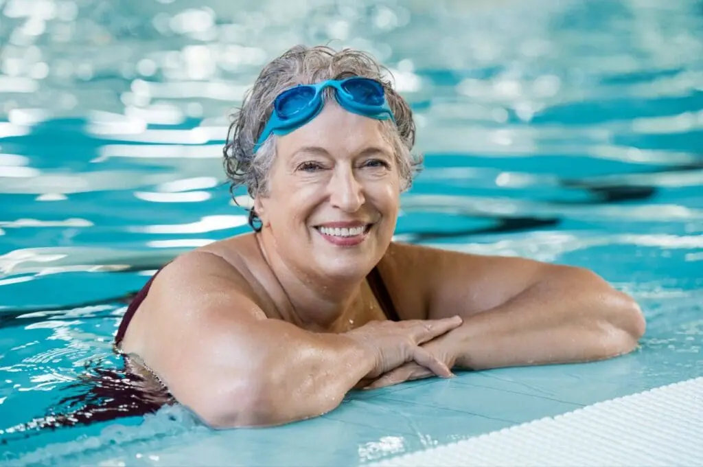 happy senior in pool