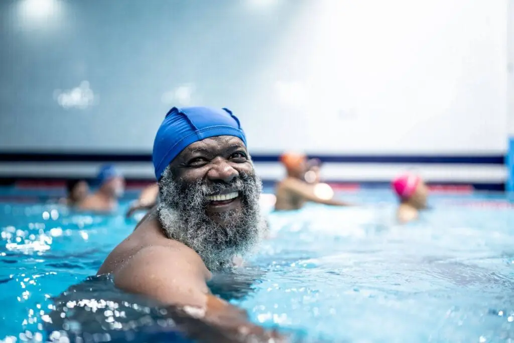 happy swimming senior
