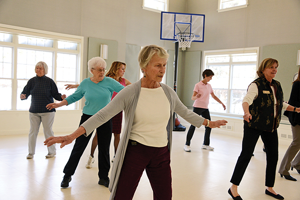 Older women exercising in a gym