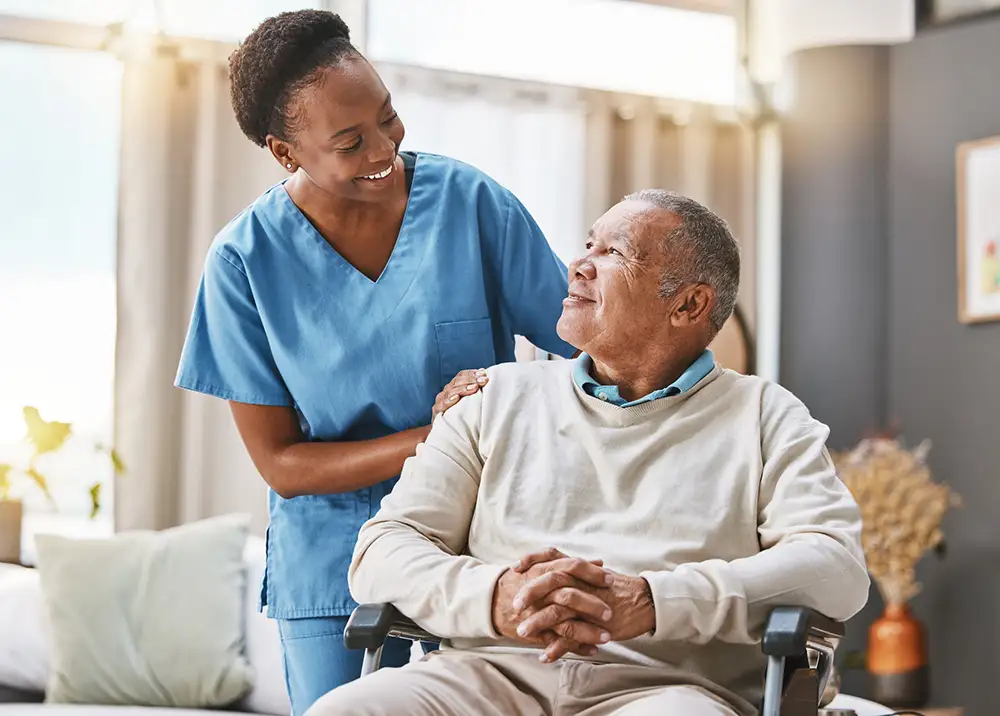 Understanding the Difference Between Assisted Living and Independent Living 2 Help, support and wheelchair with nurse and old man for disability, rehabilitation or healing. Retirement, physiotherapy and healthcare with patient and black woman nursing home for medical caregiver