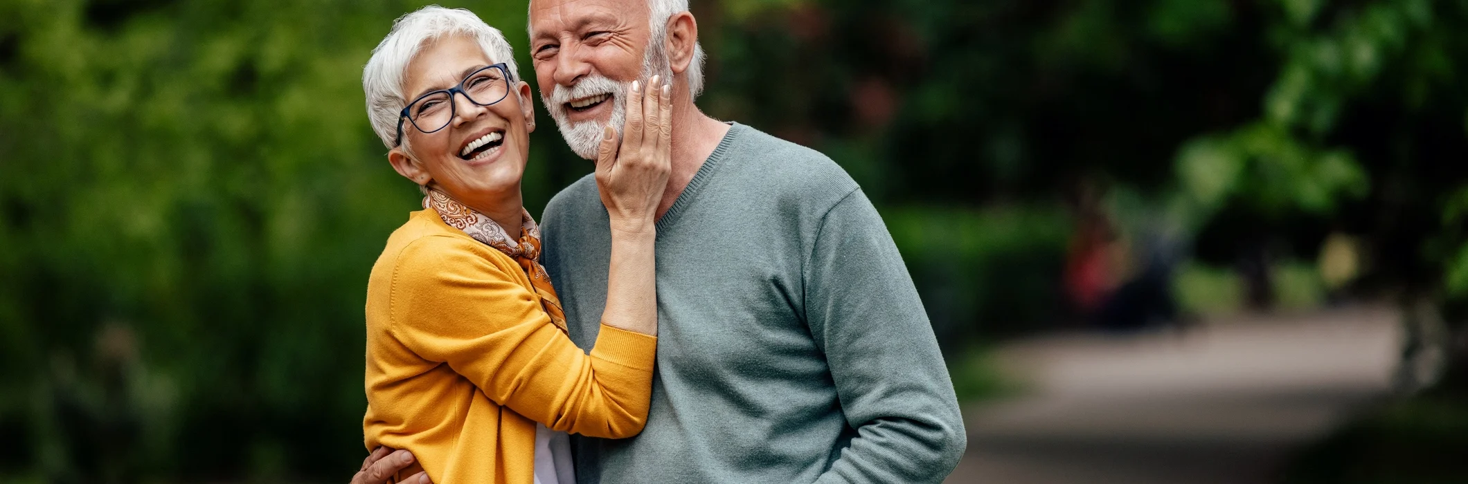Is Assisted Living Tax Deductible? A Simple Guide for Seniors and Families 1 senior couple out on walking path near The Village at Duxbury in Duxbury, MA.