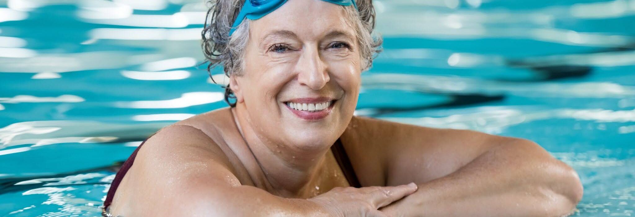Swimming for Seniors: Stay Active Without Strain 1 happy senior in pool